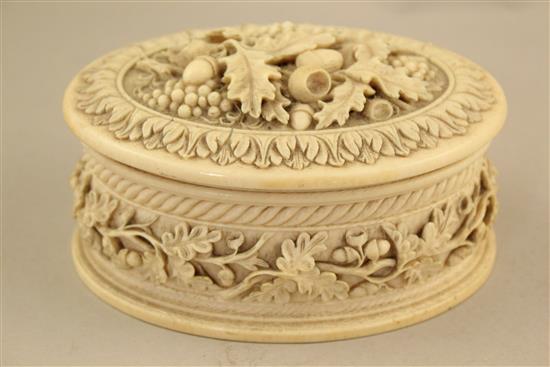 A 19th century oval carved ivory table box, 5.5in., some faults